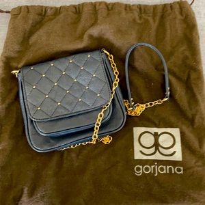 Gorjana blue leather handbag.